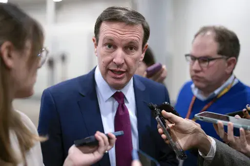 Sen. Chris Murphy, D-Conn., the Democrats' chief negotiator on the border security talks, speaks with reporters at the Capitol in Washington, Jan. 25, 2024. Senate negotiators have reached a deal on a proposal to overhaul the asylum system at the U.S. border with Mexico. It clears the way for Democratic and Republican Senate leaders to begin the difficult task of convincing Congress to pass a national security package that will include tens of billions of dollars for Ukraine and immigration enfo