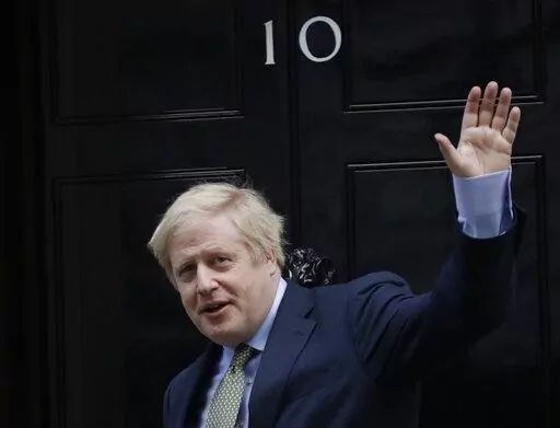 Britain's Prime Minister Boris Johnson returns to 10 Downing Street after meeting with Queen Elizabeth II at Buckingham Palace, London, Dec. 13, 2019. Boris Johnson’s bluster couldn’t hide the facts: He didn’t have the votes to win the Conservative Party leadership contest and stage a political comeback just weeks after being forced out as prime minister. (AP Photo/Matt Dunham, File)