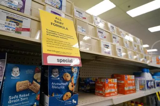 A sign is posted at a CVS pharmacy indicating a shortage in the availability of baby food Tuesday, May 10, 2022, in Charlotte, N.C. Parents in much of the U.S. are scrambling to find baby formula after a combination of supply disruptions and safety recalls have swept many of the leading brands from store shelves. (AP Photo/Chris Carlson)
