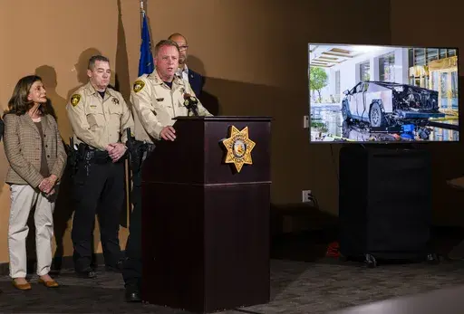 Clark County Sheriff Kevin McMahill briefs the media about the Tesla Cybertruck which exploded in front of the entrance to Trump International Hotel in Las Vegas Wednesday, Jan. 1, 2025, in Las Vegas. (Chase Stevens/Las Vegas Review-Journal via AP)
