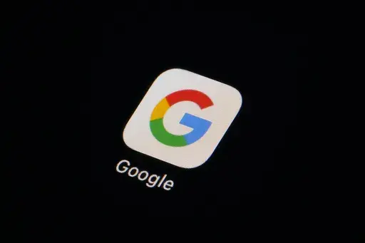 The Google app icon is seen on a smartphone, Tuesday, Feb. 28, 2023, in Marple Township, Pa. Google, on Thursday, Sept. 7, will soon require political advertising that incorporates artificial intelligence come with a prominent disclosure that the technology is being used to depict real or realistic-looking people or events. The use of AI has already begun to seep into that space and last month Federal Election Committee said that it may soon regulate AI-generated deepfakes in political ads ahead