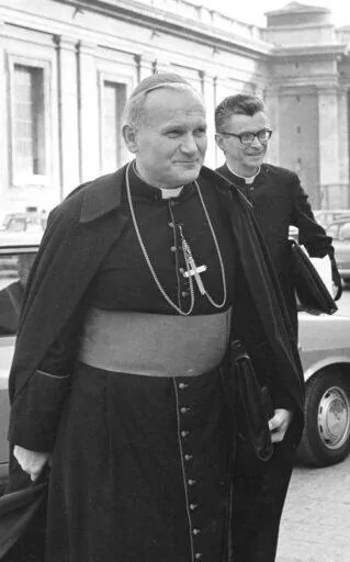 Karol Cardinal Wojtyla, archbishop of Krakow, Poland, foreground, arrives to take part in Oct. 22, 1971 working session of the World Synod of Bishops at the Vatican. Pope St. John Paul II knew about sexual abuse of children by priests under his authority and sought to conceal it when he was an archbishop in his native Poland, according to a television news report. In a story that aired late Monday, March 6, 2023, Polish channel TVN24 named three priests whom the future pope then known as Archbis