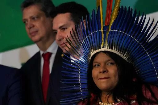 Brazil's newly-named Minister of Indigenous Peoples Sonia Guajajara attends a meeting where Brazil's President-elect Luiz Inacio Lula da Silva announced the ministers for his incoming government, in Brasilia, Brazil, Thursday, Dec. 29, 2022. Lula will be sworn-in on Jan. 1, 2023. (AP Photo/Eraldo Peres)