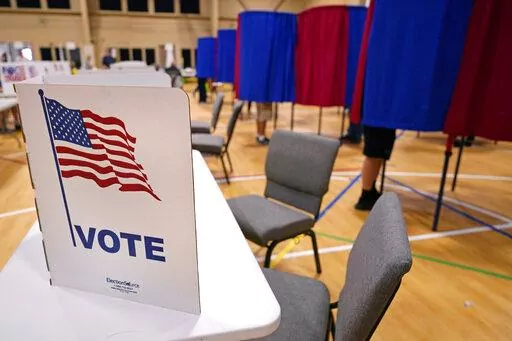 Voters cast their ballots at a polling station in Derry, N.H., on Tuesday, Sept. 13, 2022. (AP Photo/Charles Krupa, File)