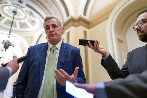 House Minority Leader Kevin McCarthy, R-Calif., talks to reporters at the Capitol in Washington, April 6, 2022. McCarthy is downplaying secretly recorded remarks he made about Donald Trump shortly after last year's attack on the Capitol. He also says he never told the then-president that he should resign — something that has not been reported. (AP Photo/J. Scott Applewhite, File)