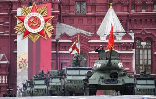 Russian military vehicles roll during the Victory Day military parade in Moscow, Russia, Monday, May 9, 2022, marking the 77th anniversary of the end of World War II. (AP Photo/Alexander Zemlianichenko)