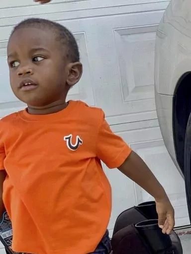This photo provided by the St. Petersburg, Fla., Police Department shows 2-year-old Taylen Mosley, who is missing. Searchers combed the area around a Florida apartment complex on Friday, March 31, 2023, for the missing 2-year-old boy whose mother was found slain in their apartment, police said. St. Petersburg Police Chief Anthony Holloway said the boy's father, 21-year-old Thomas Mosley, is considered a “person of interest” in the killing of the mother, 20-year-old Pashun Jeffery. (St. Peter
