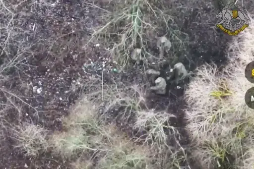 This image made from a video provided by Ukrainian Presidential Press Office on Jan. 11, 2025, shows Ukrainian forces capturing two North Korean soldiers fighting alongside Russian forces in Russia’s Kursk border region. (Ukrainian Presidential Press Office via AP)