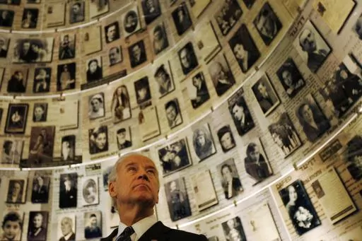 Then-Vice President Joseph Biden visits the Hall of Names at the Yad Vashem Holocaust memorial in Jerusalem, March 9, 2010. President Joe Biden has spent decades as a stalwart supporter of Israel, a connection rooted in dinner table conversations with his father about the Holocaust. Now his devotion is back in the spotlight after last week's Hamas attacks that caused the largest loss of Jewish life in a single day since the Holocaust. (AP Photo/Ariel Schalit, File)