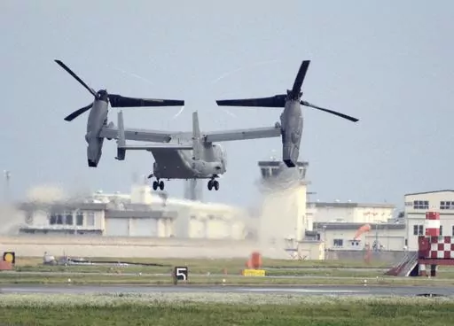 A U.S. military CV-22 Osprey takes off from Iwakuni base, Yamaguchi prefecture, western Japan, on July 4, 2018. Japanese and American military divers have spotted what could be the remains of a U.S. Air Force Osprey aircraft that crashed last week off southwestern Japan and several of the six crewmembers who are still missing, local media reported Monday, Dec. 4, 2023. (Kyodo News via AP, File)