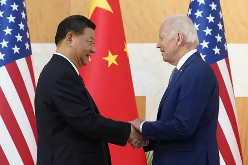 President Joe Biden, right, and Chinese President Xi Jinping shake hands before their meeting on the sidelines of the G20 summit meeting in Nusa Dua, in Bali, Indonesia on Nov. 14, 2022. The U.S. and Chinese leaders meet Wednesday while attending the annual Asia-Pacific Economic Cooperation summit in San Francisco. (AP Photo/Alex Brandon, File)