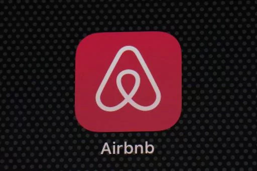 The Airbnb app icon is displayed on an iPad screen in Washington, D.C., on May 8, 2021. Airbnb reports earnings on Wednesday, Nov. 1, 2023. (AP Photo/Patrick Semansky, File)