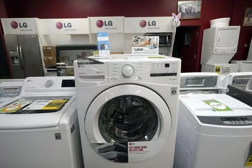 Washing machines are displayed at Sam's Appliances TV & Furniture, on March 25, 2021, in Norwood, Mass. On Thursday, the Labor Department reports on U.S. consumer prices for July. Economists expect the report to show prices rose 3.3%. (AP Photo/Steven Senne, File)