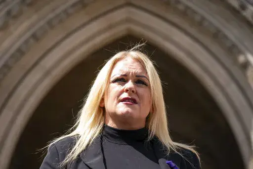 The mother of Archie Battersbee, Hollie Dance, speaks to the media outside the Royal Courts of Justice, London, Monday, July 25, 2022. The parents of a 12-year-old boy in Britain who was left in a comatose state after suffering “catastrophic” brain damage have lost a court appeal to stop doctors from ending life support for their son. Three Court of Appeal judges delivered a ruling about what was in the best interests of Archie Battersbee, who was found unconscious at home on April 7. (Domin