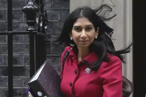 Britain's Home Secretary Suella Braverman leaves 10 Downing Street to go to the Houses of Parliament in London, on May 22, 2023. Braverman said Monday Sept. 11, 2023 she is seeking “urgent advice” on banning a type of American bully dog, highlighting an attack on a 11-year-old girl over the weekend. (AP Photo/Kin Cheung, File)