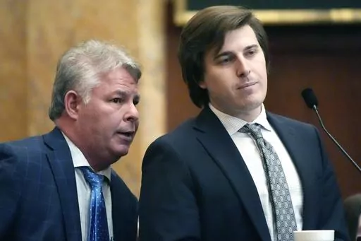 Mississippi House Education Committee Chairman Rep. Loyd Roberson II, R-Starkville, left, speaks to committee Vice Chairman Rep. Kenneth McCarty, R-Hattiesburg, as he explains a bill that would replace the Mississippi Adequate Education Program (MAEP) during debate in the chamber, Wednesday, March 6, 2024, at the Mississippi Capitol in Jackson. The Mississippi House of Representatives passed the funding alternative to MAEP, called the Inspire Act, that proponents say is a simpler funding formula