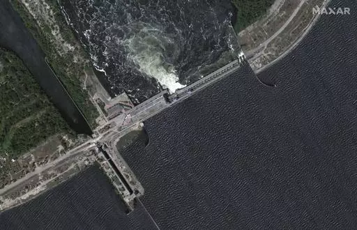This image provided by Maxar Technologies, shows Kakhovka dam and station, Ukraine before collapse, on June 5, 2023. (Satellite image ©2023 Maxar Technologies via AP)
