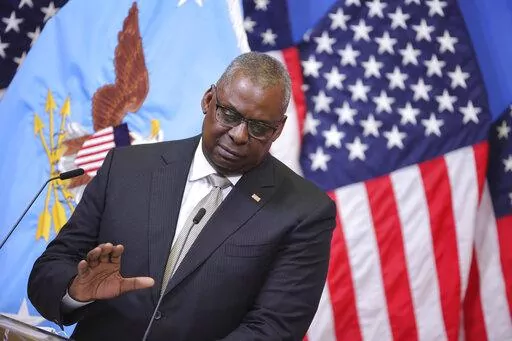 US Secretary of Defense Lloyd J. Austin III gestures as he speaks during a media conference after a meeting of NATO defense ministers at NATO headquarters in Brussels, Wednesday, Oct. 12, 2022. Ukrainian leaders are begging the U.S. and Western allies for air defense systems and longer-range weapons to keep up the momentum in their counteroffensive against Russia and fight back against Moscow’s intensified attacks. Austin says allies are committed to sending weapons “as fast as we can physic