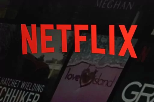 The Netflix logo is displayed on the company's website on Feb. 2, 2023, in New York. Netflix on Tuesday, May 23, 2023, outlined how it intends to crack down on the rampant sharing of account passwords in the U.S., its latest bid to reel in more subscribers to its video streaming service amid a slowdown in growth. (AP Photo/Richard Drew, File)