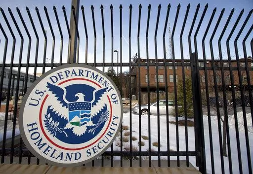 The U.S. Homeland Security Department headquarters in northwest Washington is pictured on Feb. 25, 2015. A popular Chinese-made automotive GPS tracker used by individuals, government agencies and companies in 169 countries has severe software vulnerabilities, posing a potential danger to life and limb, national security and supply chains, cybersecurity researchers said in a report released Tuesday, July 19, 2022, to coincide with an advisory from the U.S. Cybersecurity and Infrastructure Securit