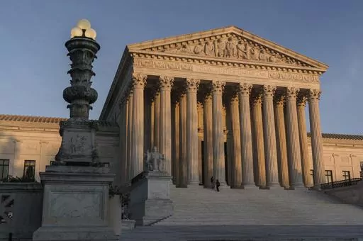 The Supreme Court is seen at sundown in Washington, on Nov. 6, 2020. The Supreme Court avoided a catastrophic accident in 2022 when a massive piece of marble at least two feet in length crashed to the ground in an interior courtyard used by the justices and their aides. (AP Photo/J. Scott Applewhite, File)