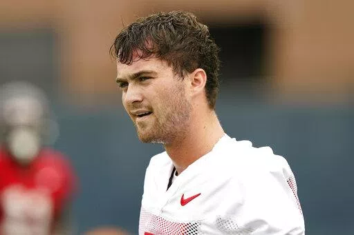 Mississippi quarterback Luke Altmyer (7) looks downfield during NCAA college football practice on Aug. 3, 2022, in Oxford, Miss. Altmyer was the backup last season but replaced an injured Matt Corral in the Sugar Bowl. (AP Photo/Rogelio V. Solis, File)