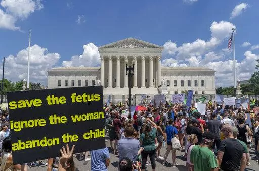 Abortion-rights protesters demonstrate outside the Supreme Court in Washington, Saturday, June 25, 2022. A new poll finds a growing percentage of Americans calling out abortion or women’s rights as priorities for the government in the wake of the Supreme Court’s decision to overturn Roe v. Wade, especially among Democrats and those who support abortion access.  (AP Photo/Gemunu Amarasinghe, File)