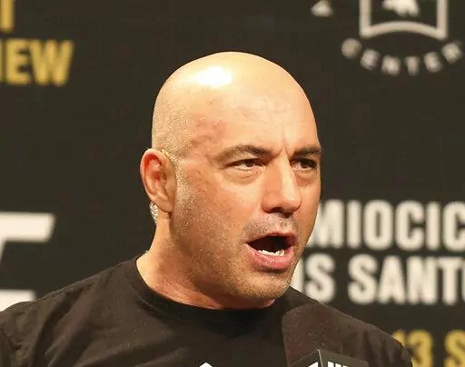 Joe Rogan is seen during a weigh-in before UFC 211 on Friday, May 12, 2017, in Dallas before UFC 211.  Spotify’s popular U.S. podcaster has apologized after a video compilation surfaced that showed him using racial slurs in clips of episodes over a 12-year span. In a video posted on his Instagram account on Saturday, Feb. 5, 2022, Rogan who hosts a podcast called “The Joe Rogan Experience,” said his use of the slurs was the “most regretful and shameful thing that I’ve ever had to talk 