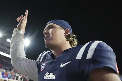 Mississippi quarterback Jaxson Dart gestures as he leaves the playing field following an NCAA college football game against Mississippi State, Friday, Nov. 29, 2024, in Oxford, Miss. (AP Photo/Rogelio V. Solis, File)