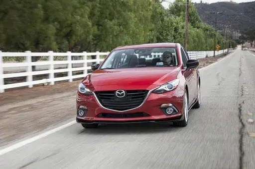 This photo provided by Mazda shows a 2016 Mazda 3. The 3 is available as a sedan or hatchback and is sporty to drive. (Courtesy of Mazda North American Operations via AP)