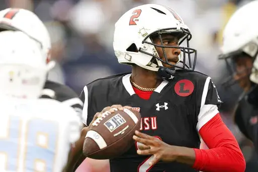 Jackson State quarterback Shedeur Sanders looks for an open receiver during the first half of an NCAA college football game against Southern University in Jackson, Miss., Saturday, Oct. 29, 2022. (AP Photo/Rogelio V. Solis)