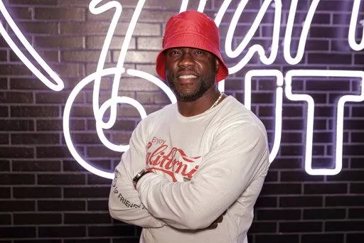 Kevin Hart poses for a portrait at the opening of his new vegan fast-food restaurant "Hart House" on Wednesday, Aug. 24, 2022 in Los Angeles. (Photo by Willy Sanjuan/Invision/AP).