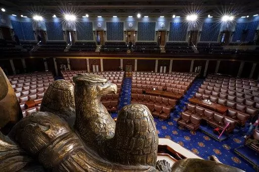 The chamber of the House of Representatives is seen at the Capitol in Washington, Monday, Feb. 28, 2022. President Joe Biden will deliver his State of the Union speech Tuesday night to a joint session of Congress and the nation. (AP Photo/J. Scott Applewhite)