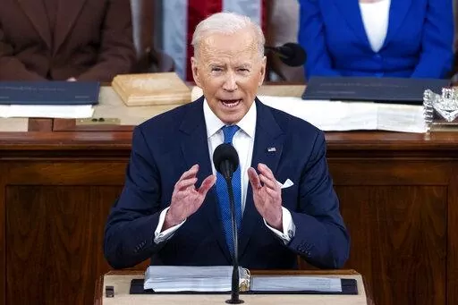 President Joe Biden delivers his first State of the Union address to a joint session of Congress at the Capitol, March 1, 2022, in Washington. A year ago, President Joe Biden used his first State of the Union address to push top Democratic priorities that were sure to face a battle in the narrowly divided Congress but he also laid out a four-pronged "unity agenda" that would be an easier sell.(Jim Lo Scalzo/Pool via AP, File)
