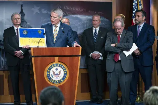 Sen. Rob Portman, R-Ohio, speaks during a news conference with Republican lawmakers about Ukraine, on Capitol Hill, Wednesday, March 2, 2022, in Washington. From left, Sen. John Hoeven, R-N.D., Portman, Sen. Lindsey Graham, R-S.C., Sen. Dan Sullivan, R-Alaska, Sen. Jim Risch, R-Idaho, and Sen. Ted Cruz, R-Texas. (AP Photo/Evan Vucci)