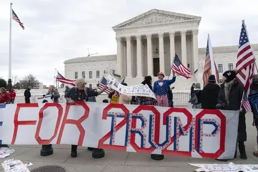 Supporters of former President Donald Trump protest outside of the Supreme Court on the second anniversary of the Jan. 6, riot at the U.S. Capitol, in Washington, Jan. 6, 2023. All eyes are on the Supreme Court in Donald Trump's federal 2020 election interference case. The conservative-majority Supreme Court's next moves could determine whether the former president stands trial in Washington ahead of the November election.(AP Photo/Jose Luis Magana, File)