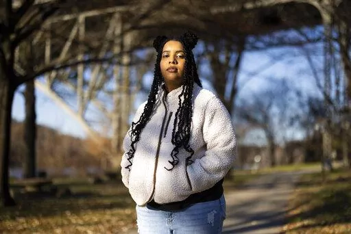 High school student Mecca Patterson-Guridy, 17, poses for a portrait in Philadelphia, Friday, Dec. 9, 2022. Scrutiny from conservatives around teaching about race, gender and sexuality has made many teachers reluctant to discuss issues that touch on cultural divides. To fill in gaps, some students, including Mecca, are looking to social media, where online personalities, nonprofit organizations and teachers are experimenting with ways to connect with them outside the confines of school. (AP Phot