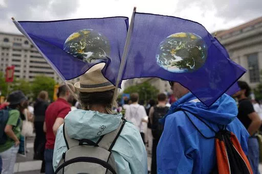 Climate activists hold a rally to protest the use of fossil fuels on Earth Day at Freedom Plaza, April 22, 2023, in Washington. (AP Photo/Carolyn Kaster, File)