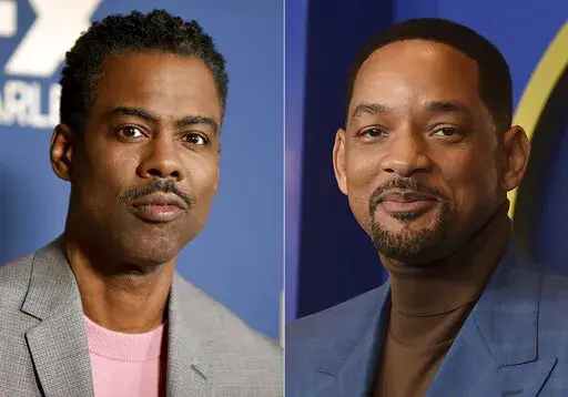 In this combo of file photos, Chris Rock, left, appears at the the FX portion of the Television Critics Association Winter press tour in Pasadena, Calif., on Jan. 9, 2020; and Will Smith appears at the 94th Academy Awards nominees luncheon in Los Angeles on March 7, 2022. Smith has again apologized to Chris Rock for slapping him during the Oscar telecast in a new video, saying that his behavior was “unacceptable” and revealing that he reached out to the comedian to discuss the incident but w