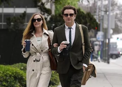 Danny Masterson and his wife Bijou Phillips arrive for closing arguments in his second rape trial, Tuesday, May 16, 2023, in Los Angeles. Masterson is charged with raping three women at his Los Angeles home between 2001 and 2003. (AP Photo/Chris Pizzello)