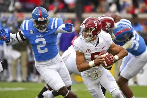 Alabama quarterback Bryce Young looks to pass during the first half of an NCAA college football game against Mississippi in Oxford, Miss., Saturday, Nov. 12, 2022. (AP Photo/Thomas Graning)