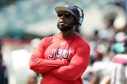 Jackson State head coach T.C. Taylor watches during the first half of the Orange Blossom Classic NCAA college football game against Florida A&M, Sunday, Sept. 3, 2023, in Miami Gardens, Fla. (AP Photo/Lynne Sladky)