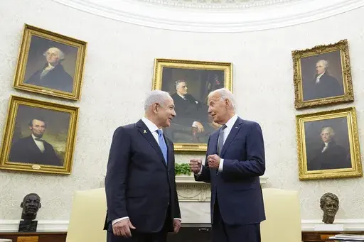President Joe Biden, right, talks with Israeli Prime Minister Benjamin Netanyahu, left, in the Oval Office of the White House in Washington, July 25, 2024. U.S. officials say the Biden administration believes it has won assurances from Israel that it will not strike Iranian nuclear or oil sites as it looks to strike back following Iran’s missile barrage earlier this month. The officials, who spoke on condition of anonymity to discuss private diplomatic discussions, cautioned that the pledge is