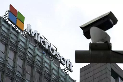 A security surveillance camera is seen near the Microsoft office building in Beijing, July 20, 2021. Microsoft says cyberattacks by state-backed Russian hackers have destroyed data across dozens of organizations in Ukraine and produced a “chaotic information environment.” The company said in a report released Wednesday, April 27, that Russia-aligned threat groups were preparing long before the Feb. 24 invasion. (AP Photo/Andy Wong, File)