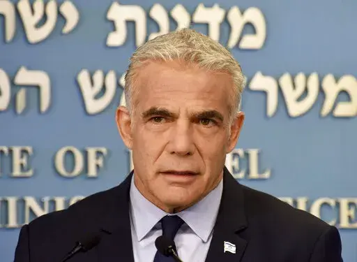 Israeli Prime Minister Yair Lapid speaks about Iran at a security briefing for the foreign press at the Prime Minister's office in Jerusalem, Wednesday, Aug. 24, 2022. Lapid called on U.S. President Joe Biden and Western powers to call off an emerging nuclear deal with Iran, saying an agreement would fail to prevent Iran from developing a nuclear bomb and reward it with billions of dollars to fund Israel's enemies. Israel's caretaker prime minister used stark language on Wednesday in his critici