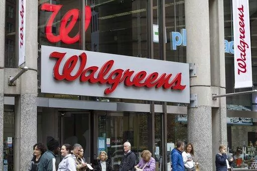 The entrance to a Walgreens is seen on Oct. 14, 2022, in Boston. Walgreens said Thursday, March 2, 2023, that it will not start selling mifepristone, an abortion pill, in 20 states that had warned of legal consequences if it did that. (AP Photo/Michael Dwyer, File)